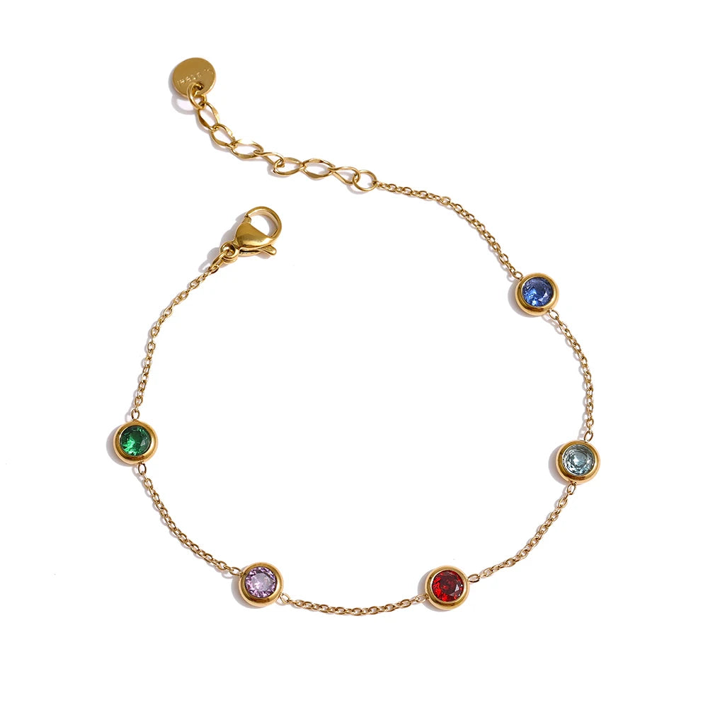 Rainbow Bracelet with Circular Zirconias displayed on a white background, adorned with circular zirconias in a variety of colors, crafted from hypoallergenic stainless steel and plated with 18k gold