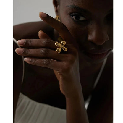 Another perspective of the Unique Creative Golden Ring being worn, illustrating how it adds a touch of originality and elegance to the wearer's ensemble