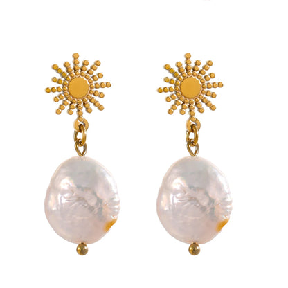 Radiate elegance with our Sun and Freshwater Pearl Earrings. Featuring a sun-shaped design and natural freshwater pearls, these 18k gold-plated, hypoallergenic stainless steel earrings exude positive energy and timeless beauty. Perfect for any occasion.