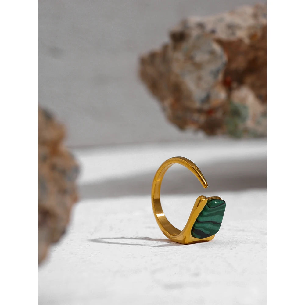 Explore the intricate details of our Vintage Verdant Ring. Its design, reminiscent of lush vegetation, evokes a sense of glamour and sophistication inspired by bygone eras.