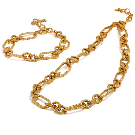 Elevate your style with our Wide Chain Necklaces and Bracelets Set. Crafted from hypoallergenic stainless steel and plated with 18k gold, this set combines elegance with sustainability. Perfect for any occasion.