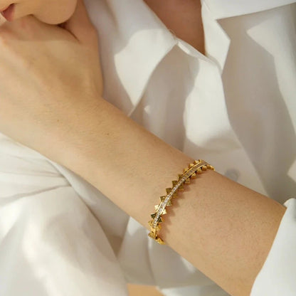 Elegant model wearing the Avant-garde Pointed Bracelet, highlighting its sophisticated design and long-lasting comfort, crafted from hypoallergenic and sustainable materials