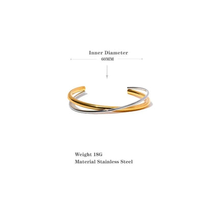 Double Color Cuff Bracelet - Contemporary Elegance. Crafted from hypoallergenic stainless steel, 18k gold plated, featuring dual silver and gold hues. Modern design for enduring elegance and comfort.