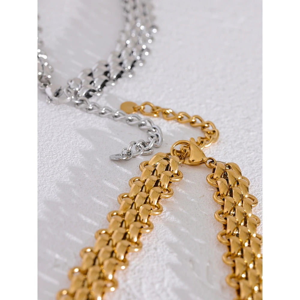 Elevate your ensemble with our Exaggerated Chain Necklace and Bracelet Set - Modern Boldness. Crafted from hypoallergenic stainless steel with sustainable 18k gold plating. Striking exaggerated chain designs for a daring and sophisticated look. Comfortable and versatile for any occasion.