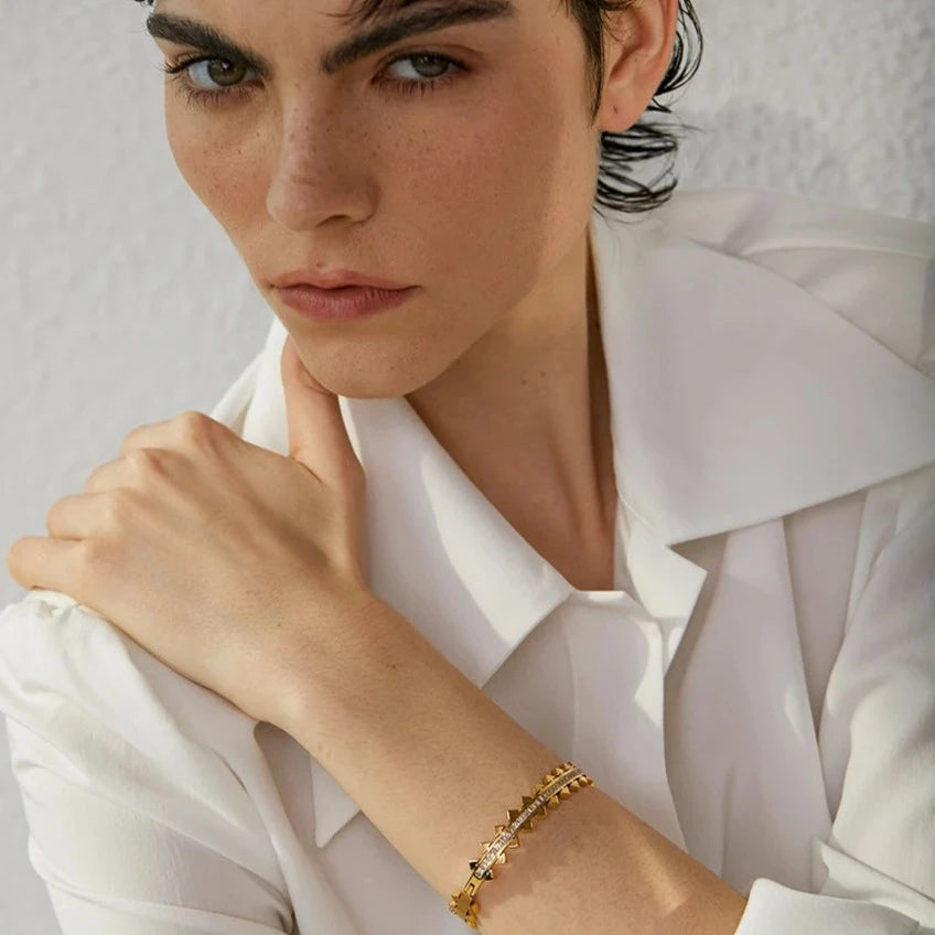 Stylish model showcasing the Avant-garde Pointed Bracelet, emphasizing its avant-garde style and versatility for various occasions