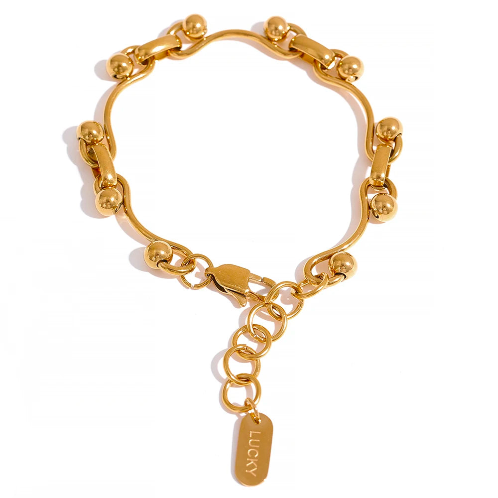 Exotic Quirky Chain Bracelet and Necklace Set, hypoallergenic stainless steel, 18k gold-plated, for elegance and durability.