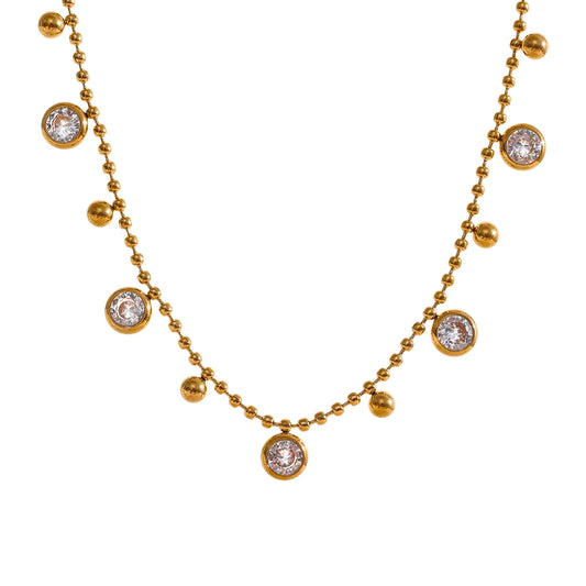 Necklace with Spherical Pendants and Circular Zirconias displayed on a white background, featuring captivating spherical designs adorned with dazzling circular zirconias, crafted from hypoallergenic stainless steel with luxurious 18k gold plating