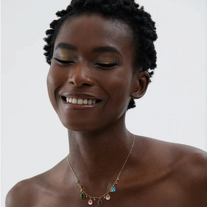 Model wearing the Multicolored Shine Zirconia Necklace, showcasing its vibrant sparkle and sophisticated look, made from sustainable stainless steel with 18k gold plating