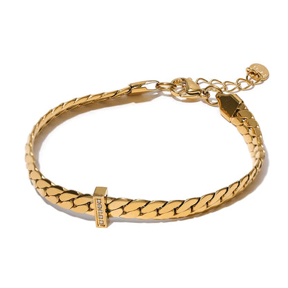 Basic Cuban Bracelet displayed on a white background, showcasing its chic and modern Cuban design, crafted from hypoallergenic stainless steel and plated with 18k gold, adorned with cubic zirconias.