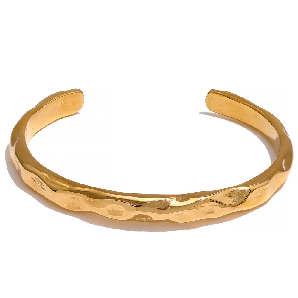 Simplicity Cuff Bracelet - Timeless Minimalism. Crafted from hypoallergenic stainless steel, finished with durable 18k gold plating. Minimalist design for understated elegance, versatile for any occasion.