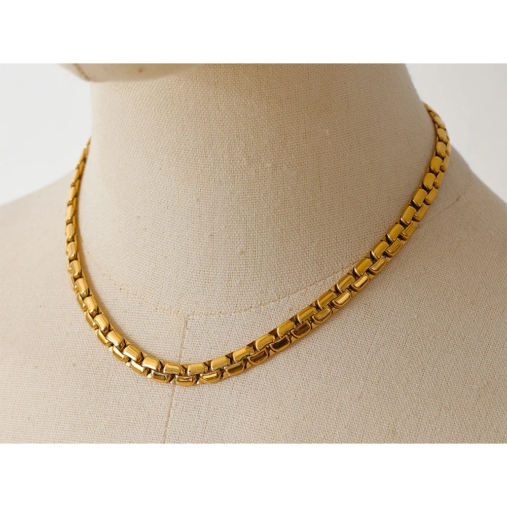 Introducing our Thick Chain Necklace and Bracelet Set - Bold Sophistication. Crafted from hypoallergenic stainless steel and plated with sustainable 18k gold. Imposing thick chains for a striking presence. Versatile elegance for any occasion. Eco-conscious and enduring comfort.