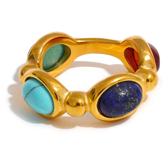 Indulge in nostalgia with our Colorful Stone Vintage Ring, boasting vibrant natural stones on a vintage-inspired band. Crafted from sustainable stainless steel with an 18k gold finish, this ring offers timeless elegance and conscious style.