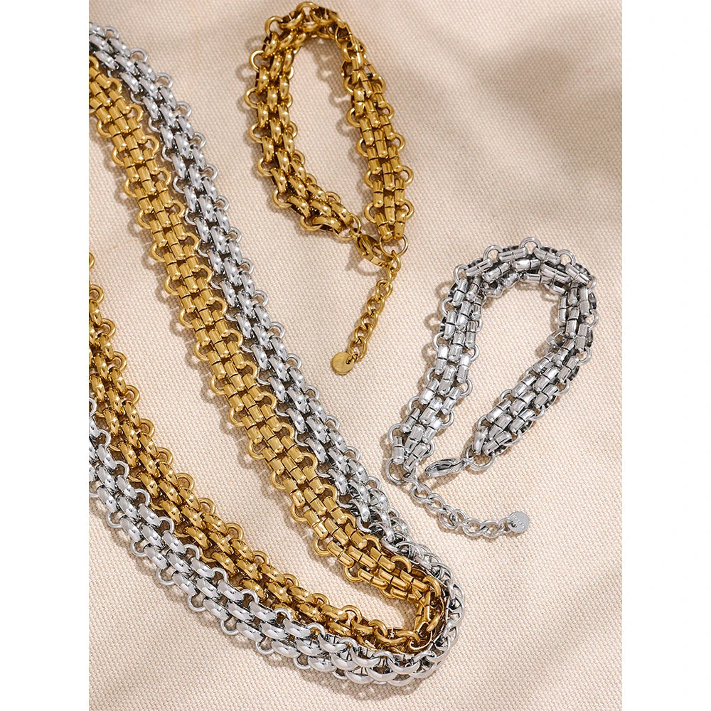 Elevate your ensemble with our Exaggerated Chain Necklace and Bracelet Set - Modern Boldness. Crafted from hypoallergenic stainless steel with sustainable 18k gold plating. Striking exaggerated chain designs for a daring and sophisticated look. Comfortable and versatile for any occasion.