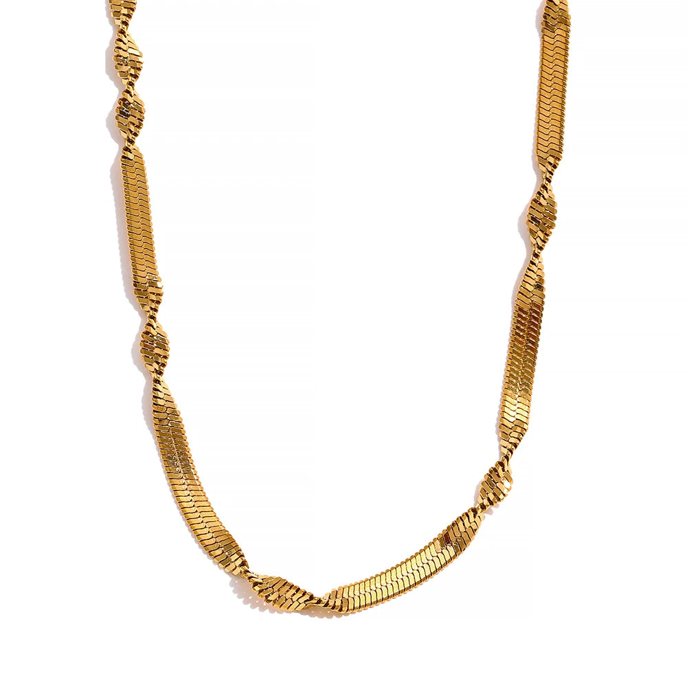 Elevate your style with our Flat Twisted Chain Necklace and Bracelet Set. Crafted from hypoallergenic stainless steel and plated with 18k gold, this set combines flat and twisted chains for an elegant and versatile look. Perfect for any occasion.