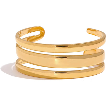 Triple Cuff Bracelet - Contemporary Sophistication. Crafted from hypoallergenic stainless steel with sustainable 18k gold plating. Versatile triple-sectioned design for elegant allure. Comfortable and enduring for all occasions.