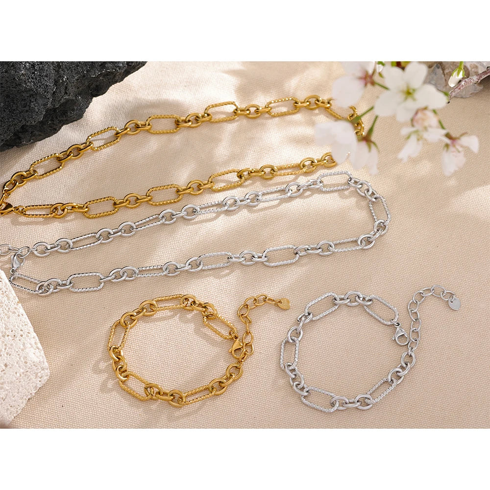 Elevate your style with our Wide Chain Necklaces and Bracelets Set. Crafted from hypoallergenic stainless steel and plated with 18k gold, this set combines elegance with sustainability. Perfect for any occasion.