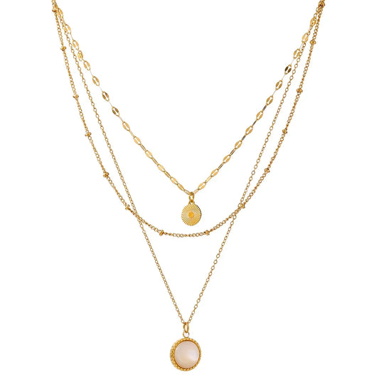 Multi Chain Bohemian Necklace - Boho Chic Elegance. Crafted from hypoallergenic stainless steel, 18k gold plated, featuring three chains and a round pendant. Blend of bohemian charm and contemporary style for versatile sophistication. Comfortable, durable, and sustainably crafted for enduring beauty.