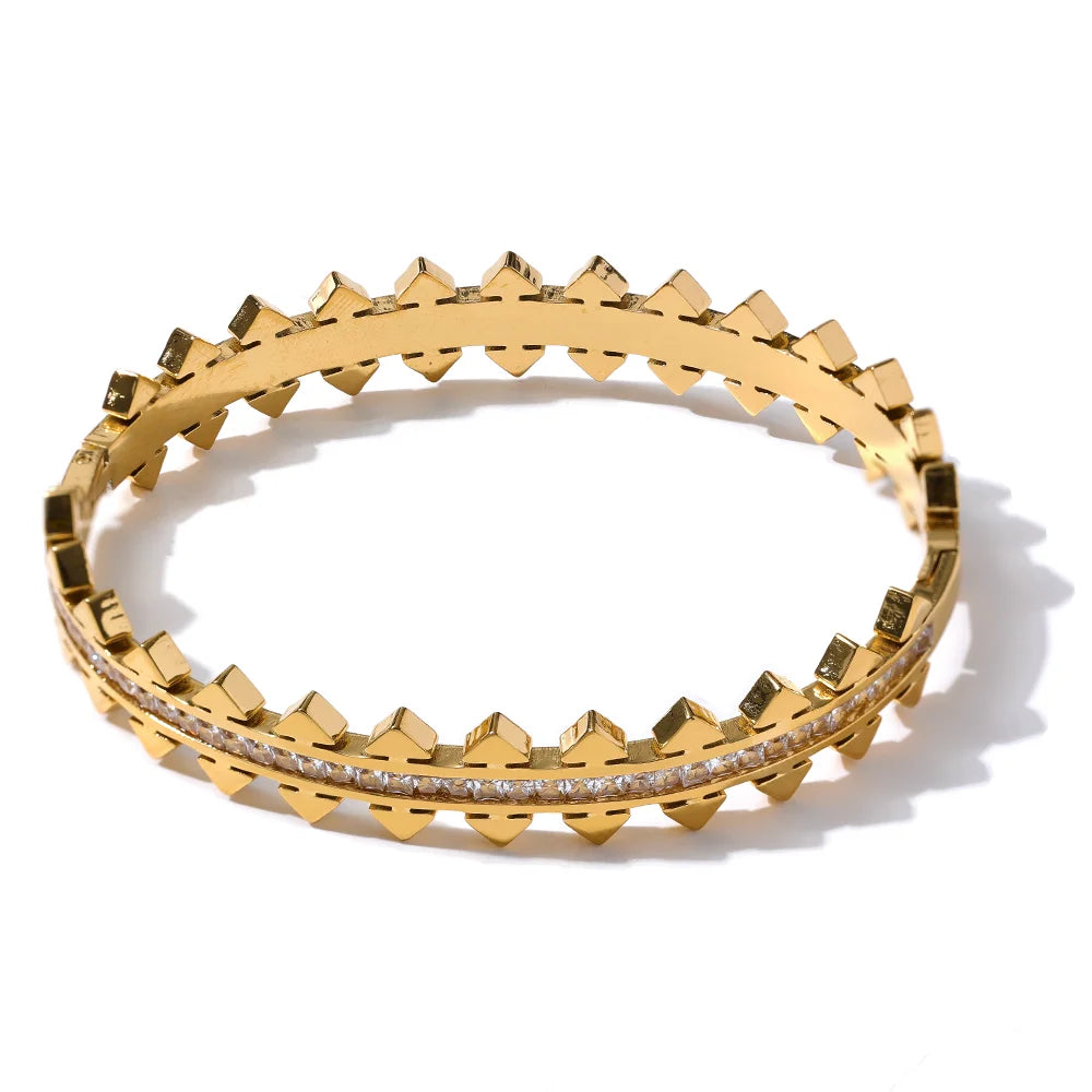 Avant-garde Pointed Bracelet displayed on a white background, featuring its pointed design, crafted from hypoallergenic stainless steel and plated with 18k gold