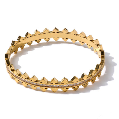 Avant-garde Pointed Bracelet displayed on a white background, featuring its pointed design, crafted from hypoallergenic stainless steel and plated with 18k gold