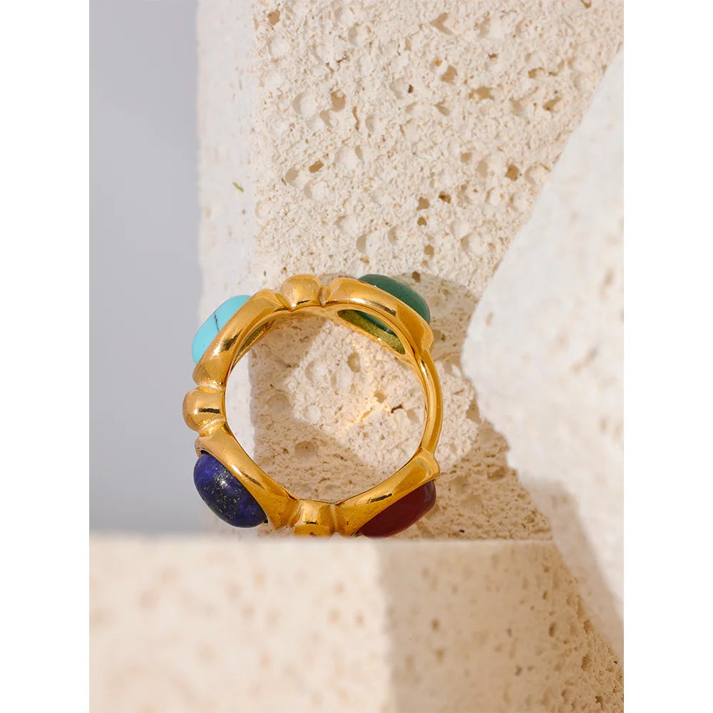  A close-up of the Colorful Stone Vintage Ring, focusing on the intricate details of the colorful natural stones and vintage-inspired band.