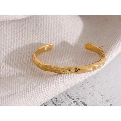 Simplicity Cuff Bracelet - Timeless Minimalism. Crafted from hypoallergenic stainless steel, finished with durable 18k gold plating. Minimalist design for understated elegance, versatile for any occasion.