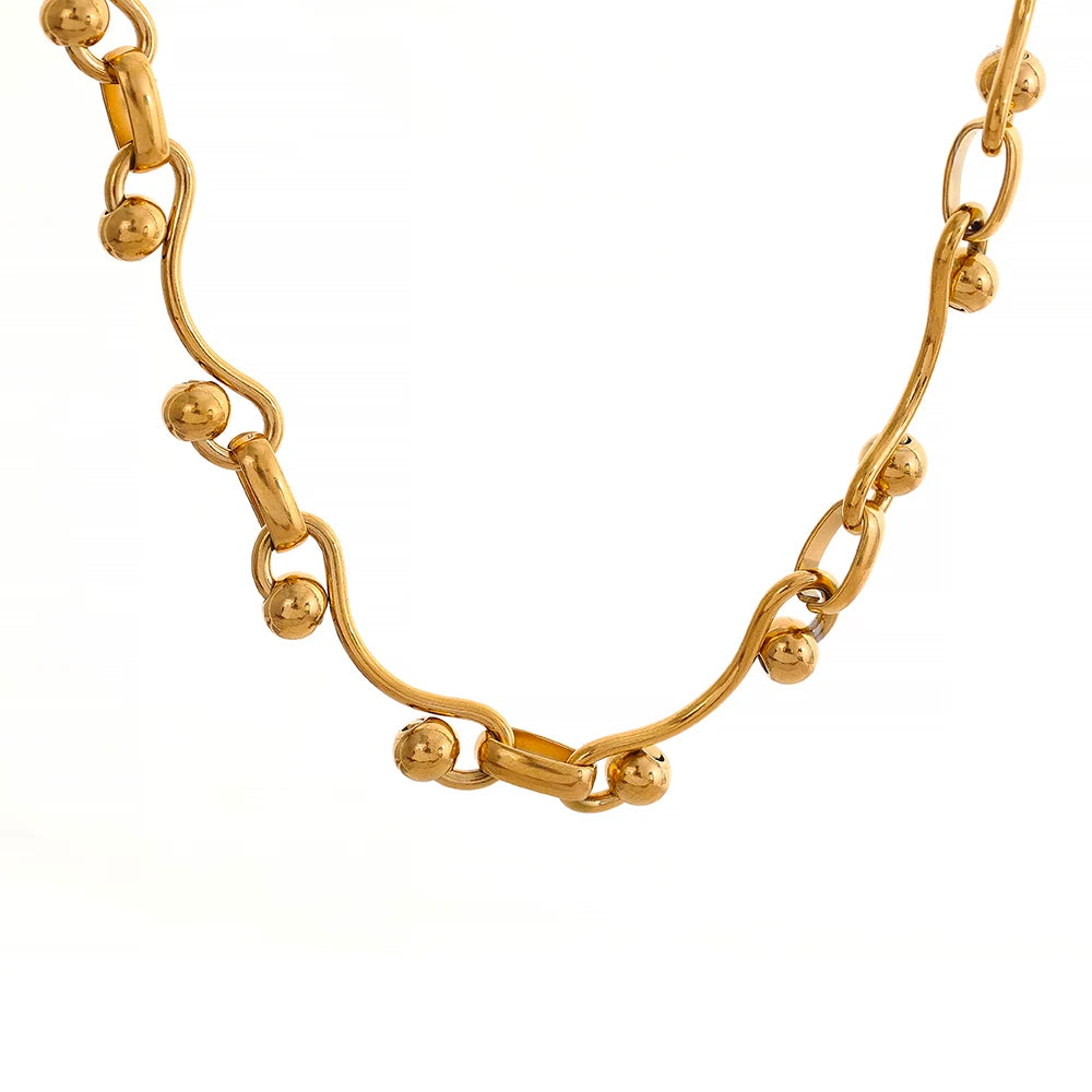 Exotic Quirky Chain Bracelet and Necklace Set, hypoallergenic stainless steel, 18k gold-plated, for elegance and durability.