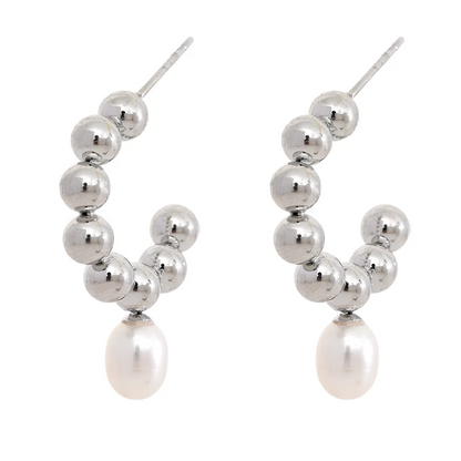 The Mini Sphere Hoop earrings with Pearl Dangle feature a charming contemporary design with small sphere hoops and delicate simulated pearls. Crafted from hypoallergenic, eco-friendly stainless steel with a durable 18k gold plating, they offer durability and sustainability for an elegant, conscious lifestyle.