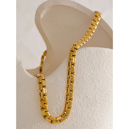 Introducing our Thick Chain Necklace and Bracelet Set - Bold Sophistication. Crafted from hypoallergenic stainless steel and plated with sustainable 18k gold. Imposing thick chains for a striking presence. Versatile elegance for any occasion. Eco-conscious and enduring comfort.