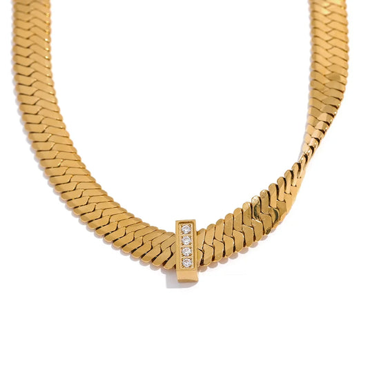 Basic Cuban Necklace displayed on a white background, featuring a wide Cuban chain design, crafted from hypoallergenic stainless steel and plated with 18k gold.