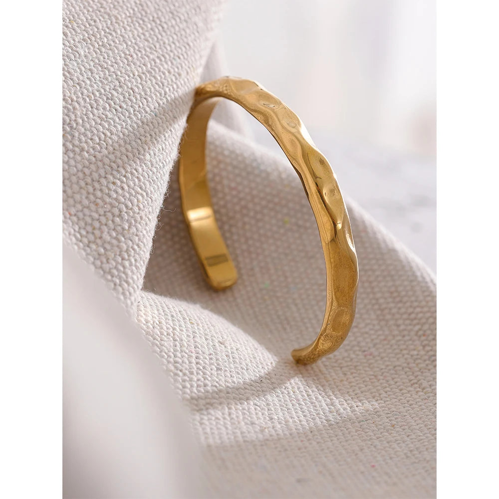 Simplicity Cuff Bracelet - Timeless Minimalism. Crafted from hypoallergenic stainless steel, finished with durable 18k gold plating. Minimalist design for understated elegance, versatile for any occasion.