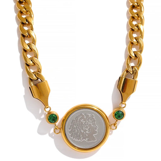 Introducing our African Coin Pendant Necklace - Celebrating Heritage. Crafted from hypoallergenic stainless steel and plated with sustainable 18k gold. Features an elegant African coin pendant on a sleek chain. Seamlessly blends tradition with contemporary style. Versatile for any occasion. Eco-conscious and enduring.