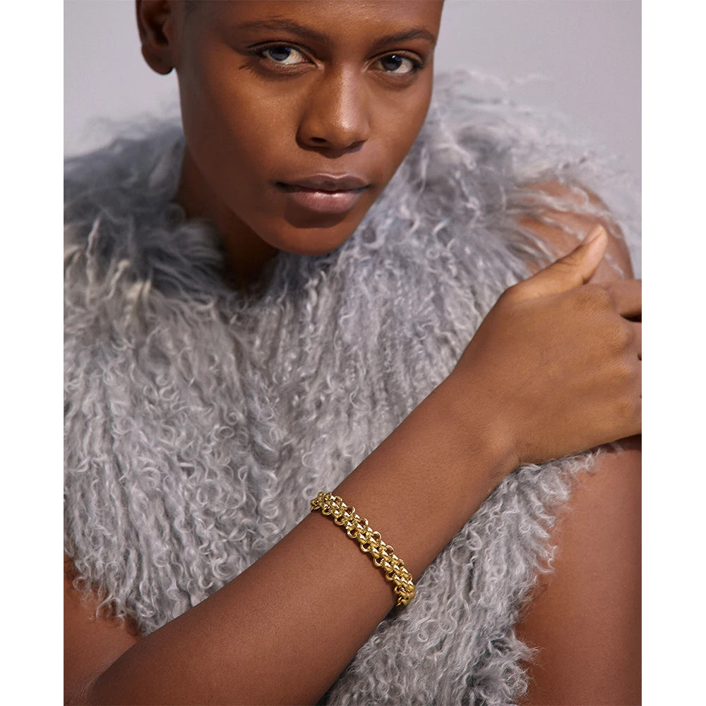 Elevate your ensemble with our Exaggerated Chain Necklace and Bracelet Set - Modern Boldness. Crafted from hypoallergenic stainless steel with sustainable 18k gold plating. Striking exaggerated chain designs for a daring and sophisticated look. Comfortable and versatile for any occasion.