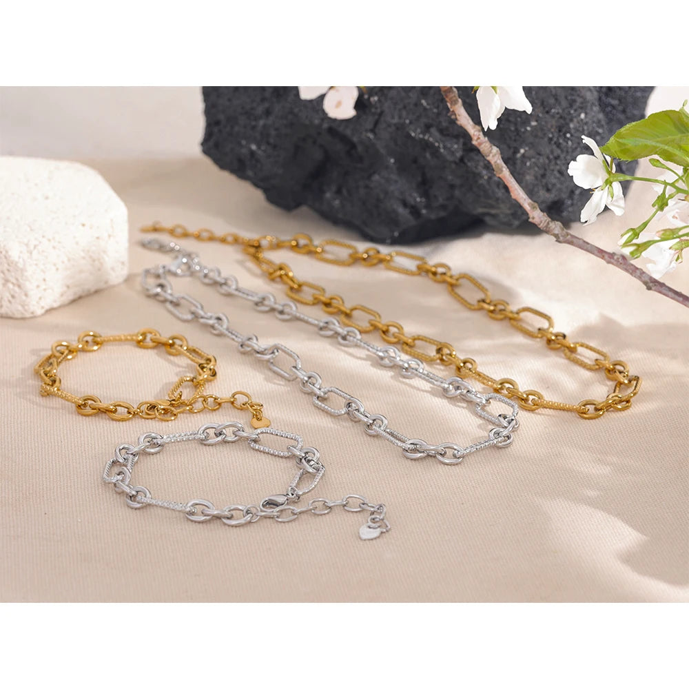 Elevate your style with our Wide Chain Necklaces and Bracelets Set. Crafted from hypoallergenic stainless steel and plated with 18k gold, this set combines elegance with sustainability. Perfect for any occasion.